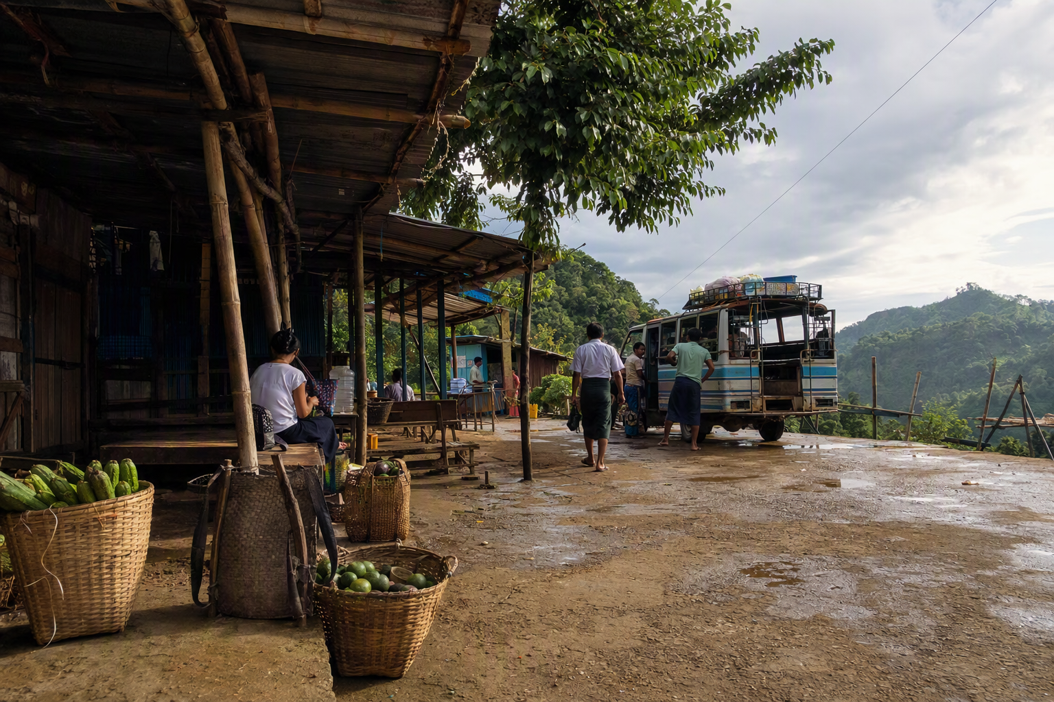 A shared roadside landing with market baskets, school materials, water containers, and public transport against distant ridges